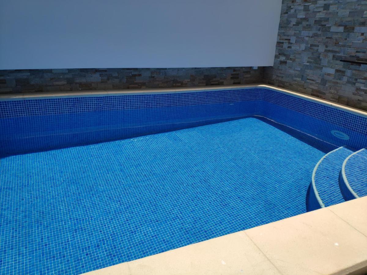 Apartamentos Timas #2 Praia Bagian luar foto